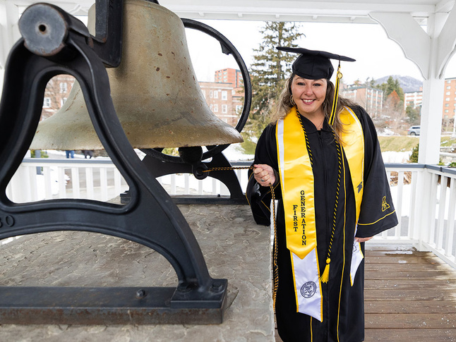 Rashell Fuentes First Generation ringing the Founders Day bell.